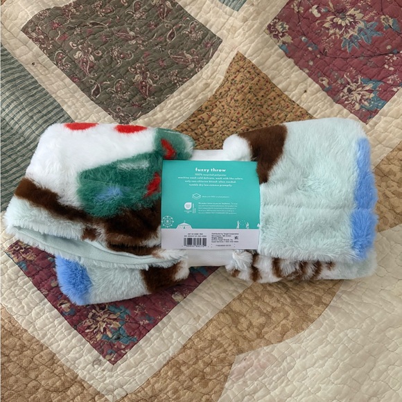 Pillowfort Fuzzy Throw with Penguin and Candy Design - Picture 4 of 6